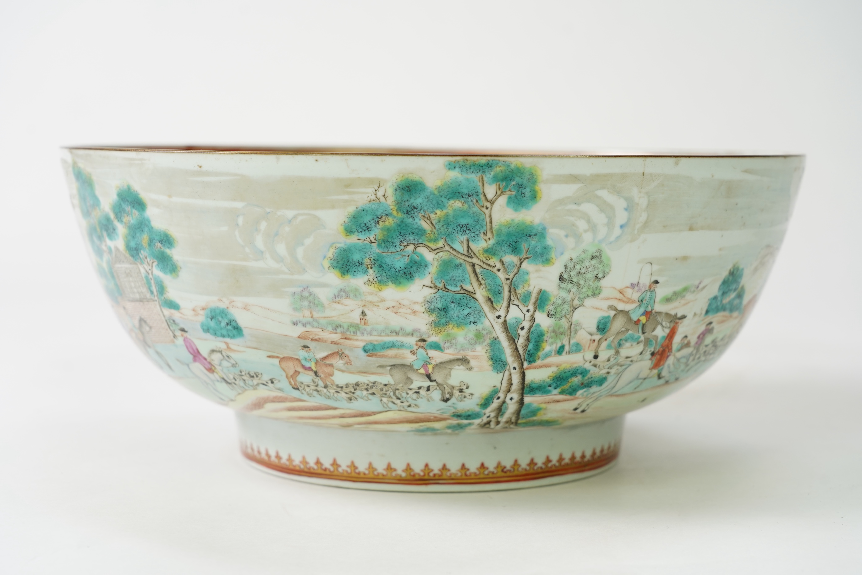 A large Chinese European subject ‘hunting’ punch bowl, Qianlong period
